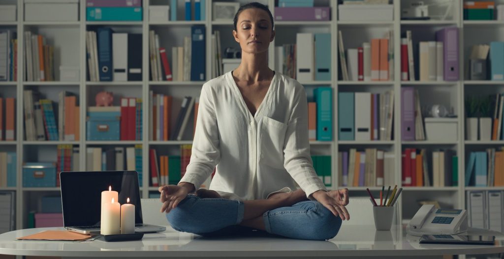 woman-practicing-meditation-at-home-e1669294103742-1024x527-1